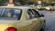 شاهد بالصور .. سائق تكسي في العاصمة عمان يبدع برصد كاميرات الأمانة