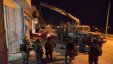 الاحتلال يعتقل 15 مواطنًا ويصادر أموالًا وسيارة ويغلق ورشة حدادة