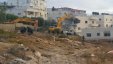 جرافات الاحتلال تهدم بناية في حي بيت حنينا