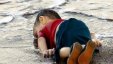 التركية مصورة جثة الطفل السوري: 
